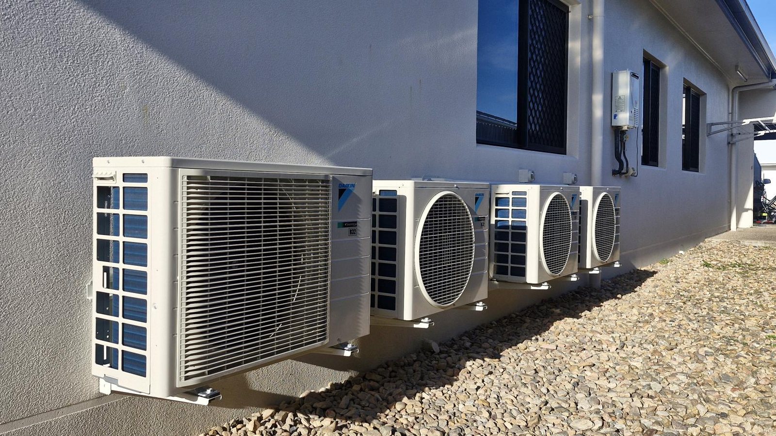 Outdoor air conditioning units installed by Climatec Solutions NQ