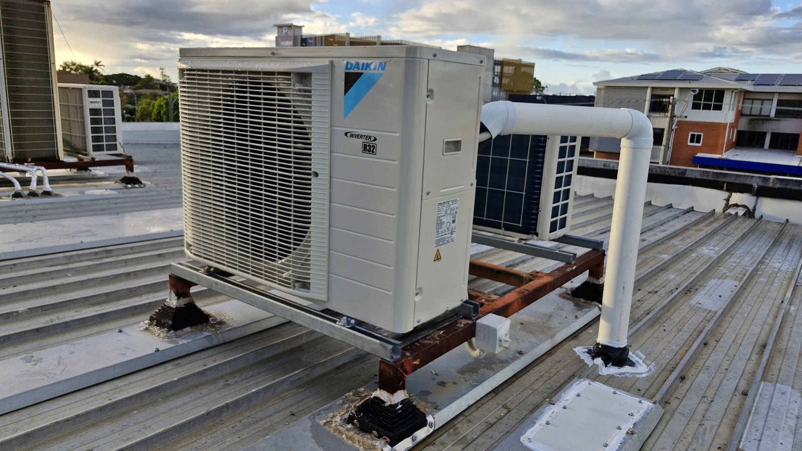 Commercial rooftop air conditioning equipment installed by Climatec Solutions NQ